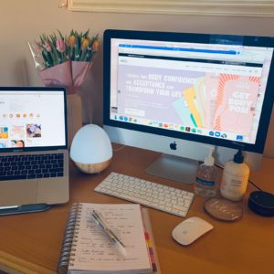 Photograph showing Laptop and Desktop Apple Macs - working from home