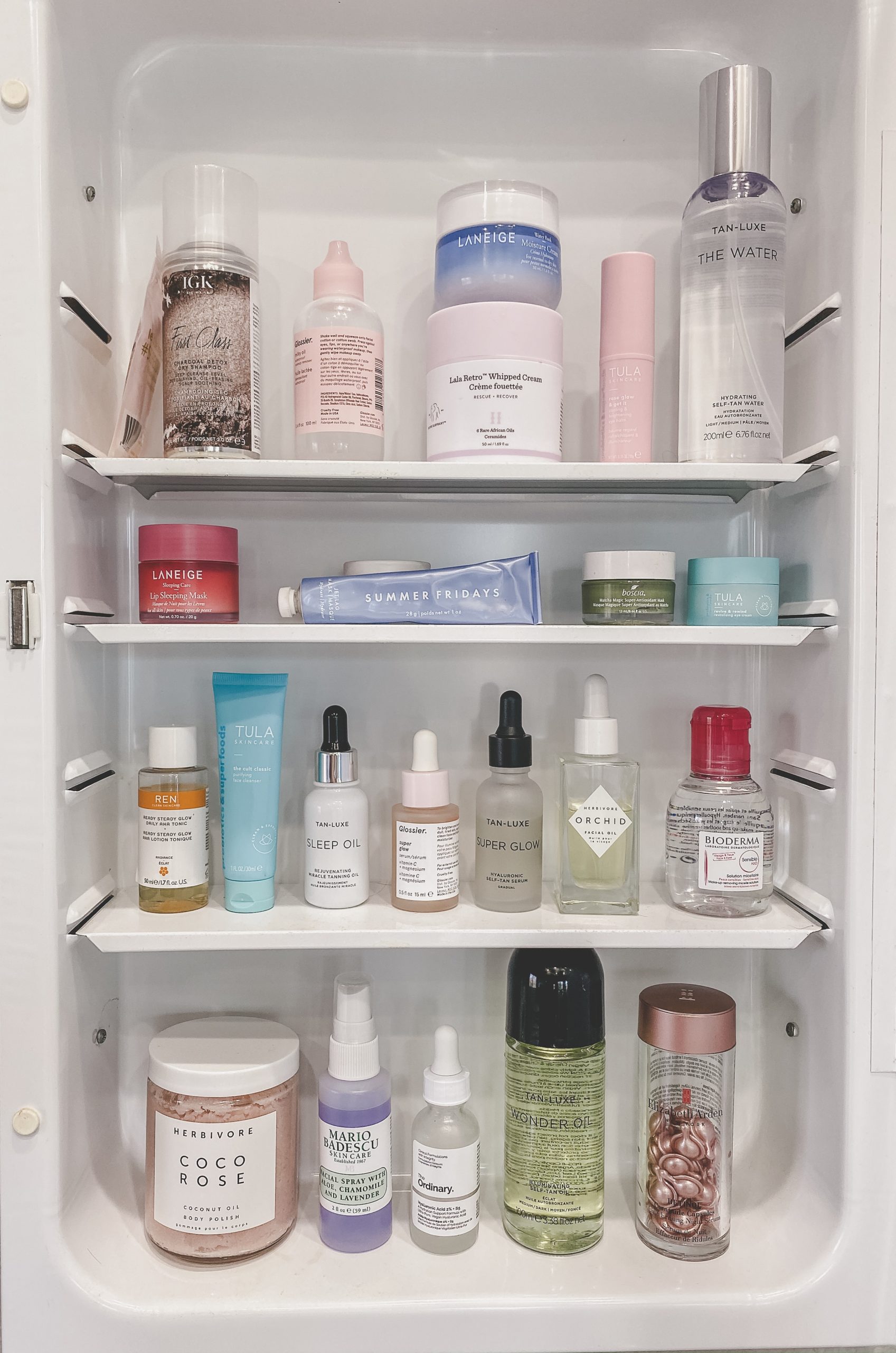 Medicine cabinet with variety of cosmetic items